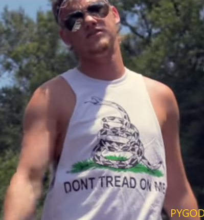 OUTLAW hick hop country rapper wearing Don't Tread On Me shirt. PYGear.com