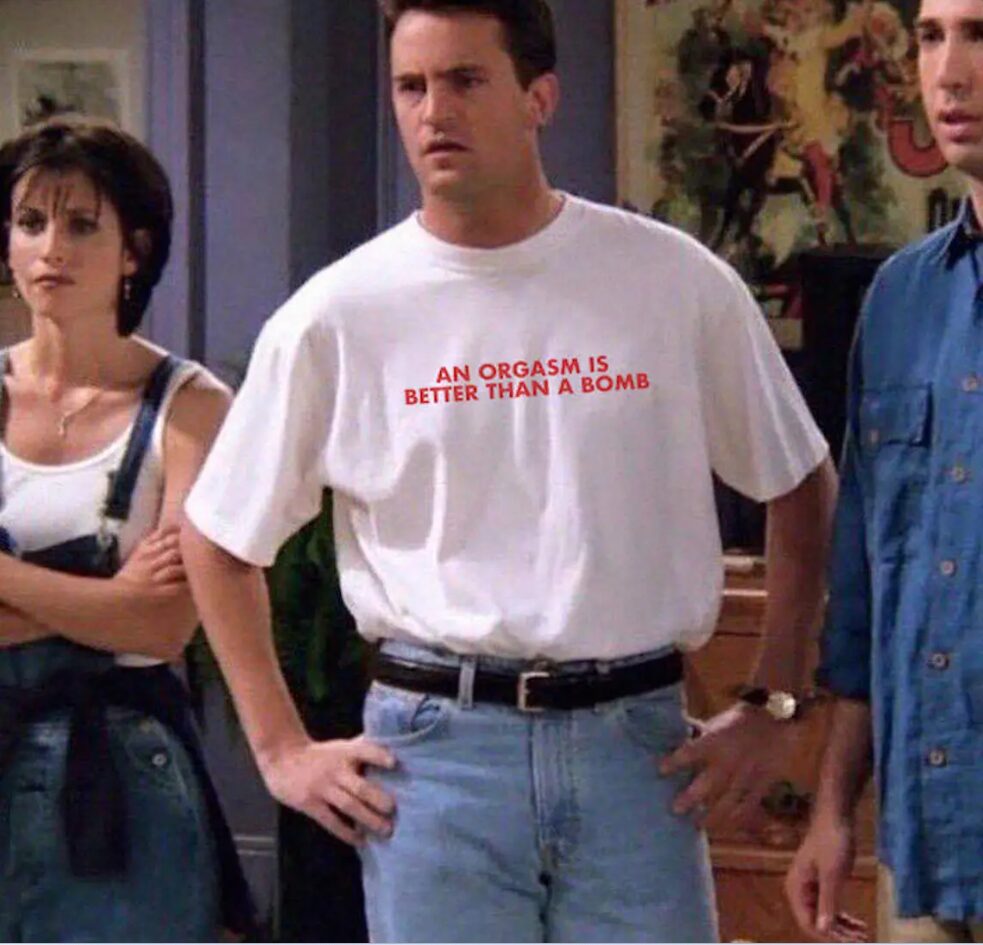 An Orgasm Is Better Than A Bomb T-Shirt as worn by Chandler Bing in Friends