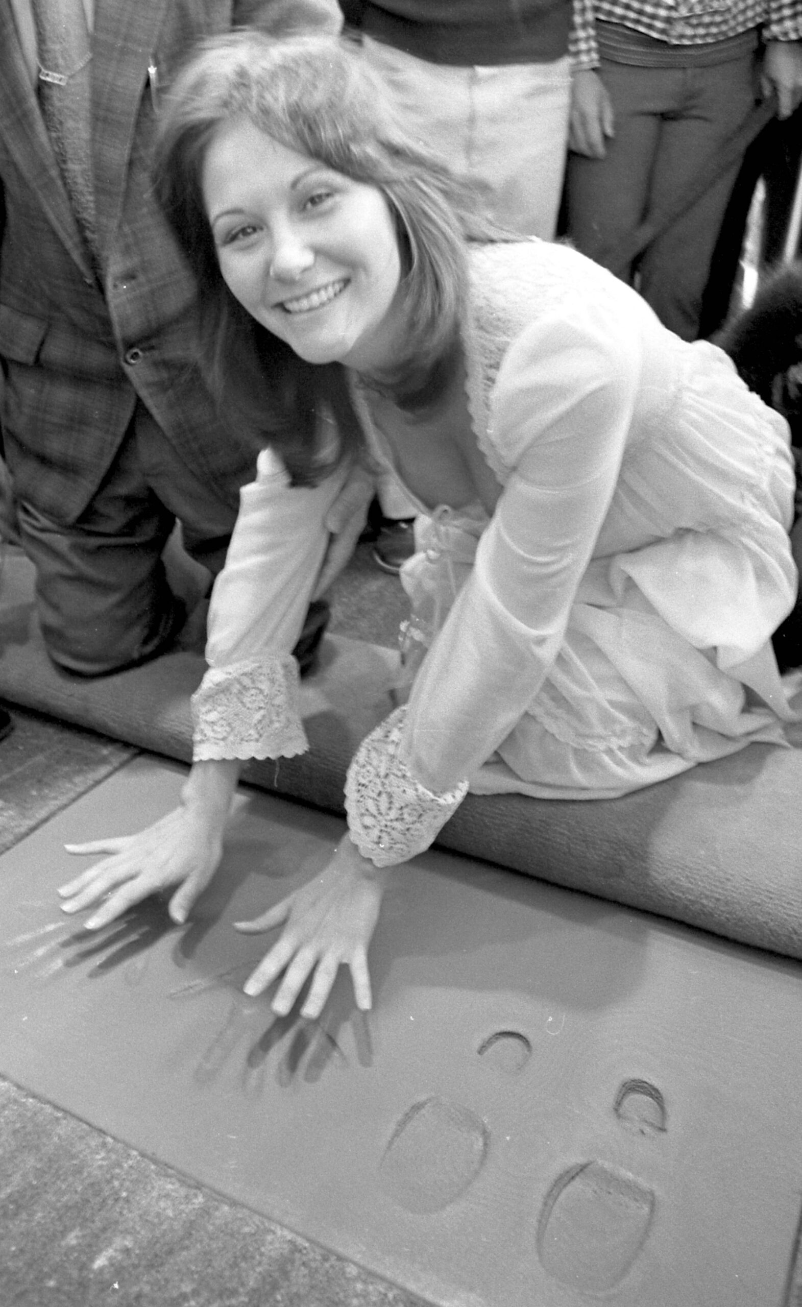 Linda Lovelace leaving hand imprints in front of the Pussycat Theater in Los Angeles, California on December 28, 1973