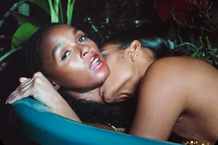 Janelle Monae making love with another woman