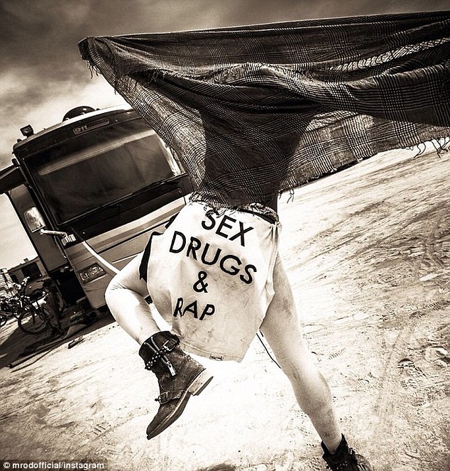Michelle Rodriguez SEX DRUGS & RAP sweatshirt when partying at Burning Man
