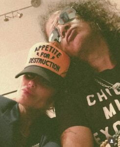 Slash with groupie Appetite For Destruction trucker hat