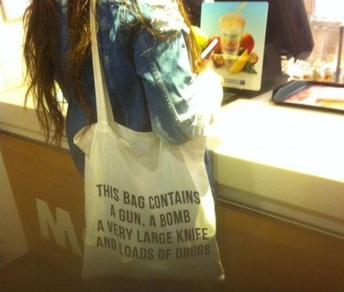 This Bag Contains A Gun A Bomb A Very Large Knife And Loads Of Drugs tote bag for air travel