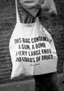 Unsafe Bag - This Bag Contains A Gun A Bomb A Very Large Knife And Loads Of Drugs tote bag