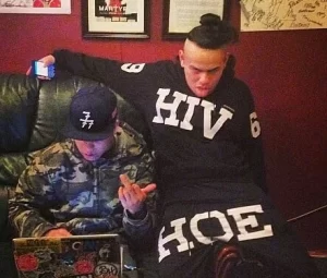 6ix9ine in his HIV HOE outfit