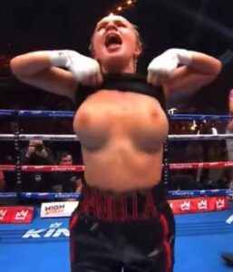 Boxer Daniella Hemsley flashing her boobs after winning (uncensored)