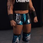 Carmello Hayes Melo CHAMPION shirt WWE2K22