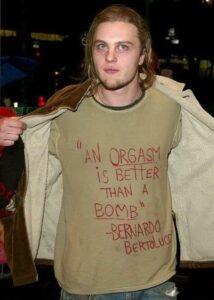 An ORGASM Is Better Than A BOMB - Bernardo Bertolucci quote shirt as worn by Michael Pitt