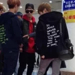 I've Never Wanted To Piss On Someone's Face More Than I Want To Piss On Yours zip-up hoodie worn by members of the K-pop boy band EXO