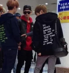 I've Never Wanted To Piss On Someone's Face More Than I Want To Piss On Yours zip-up hoodie worn by members of the K-pop boy band EXO