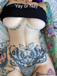Yay or Nay tattooed woman with fake boobs
