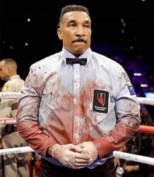 Boxing Referee covered with Blood