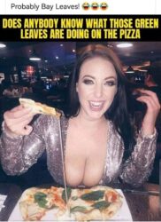 Does anybody know what those green leaves are doing on the pizza - Big boobs woman deep cleavage