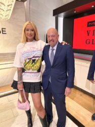 Iggy Azalea and Jim Cramers meme - Crypto bro with his GF after the great bull run of 2058