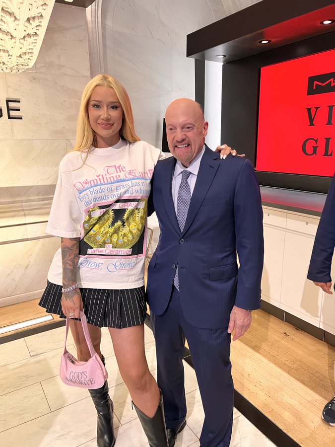 Iggy Azalea and Jim Cramers meme - Crypto bro with his GF after the great bull run of 2058