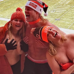 Dolph Ziggler aka Nic Nemeth with topless big tits women at a NFL football game