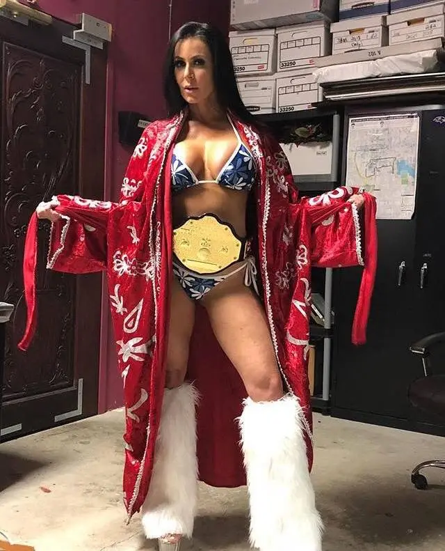 Kendra Lust dressed as pro wrestler RicFlair