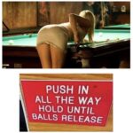 Push in all the way hold until balls release