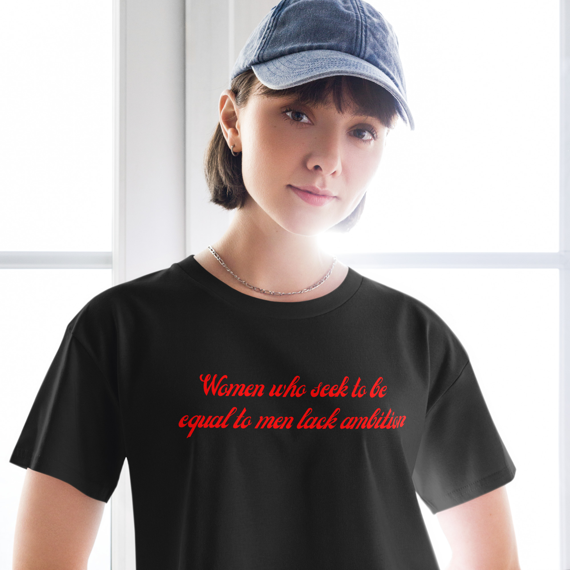 Women Who Seek To Be Equal To Men Lack Ambition (in red letters) Women’s crop top - Image 2